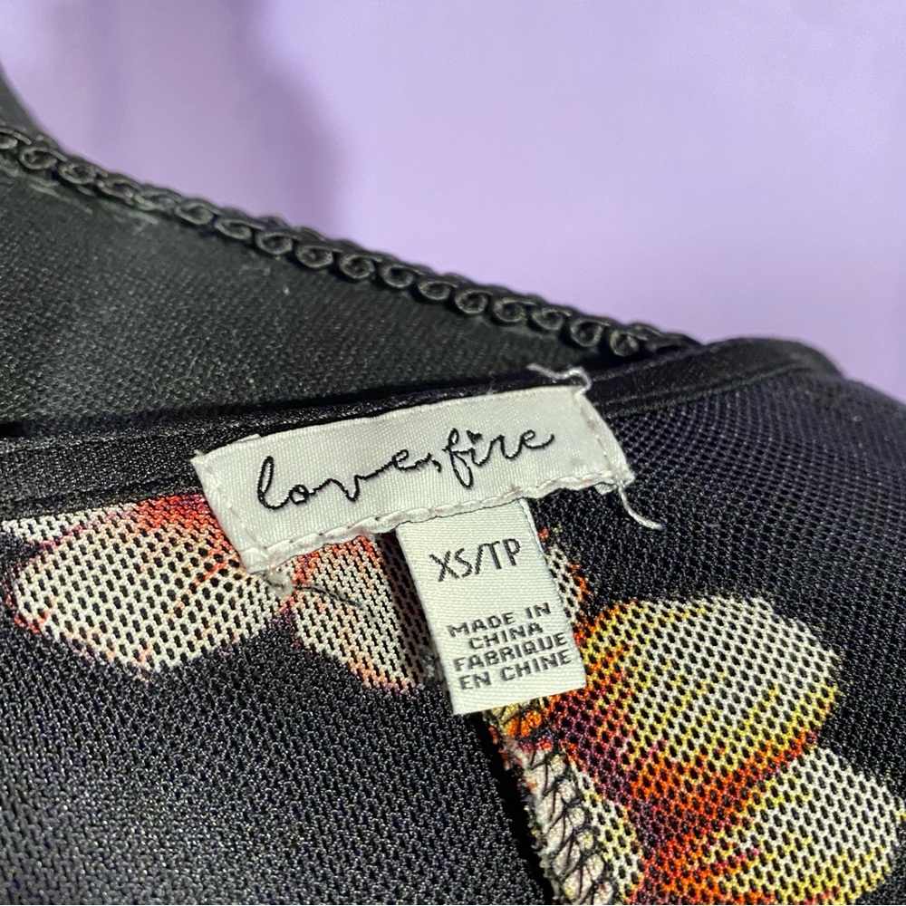 lovefire brand sheer mesh orange and pink floral tee, lettuce hem